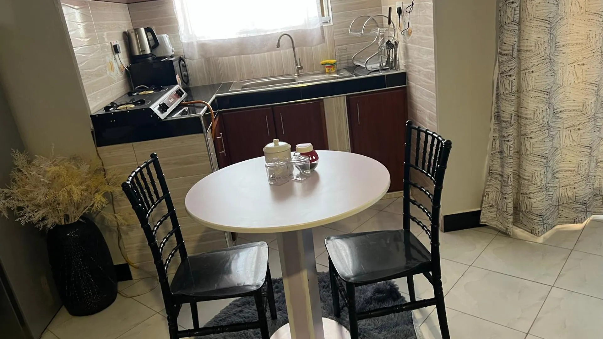 Cozy Apartment كامبالا